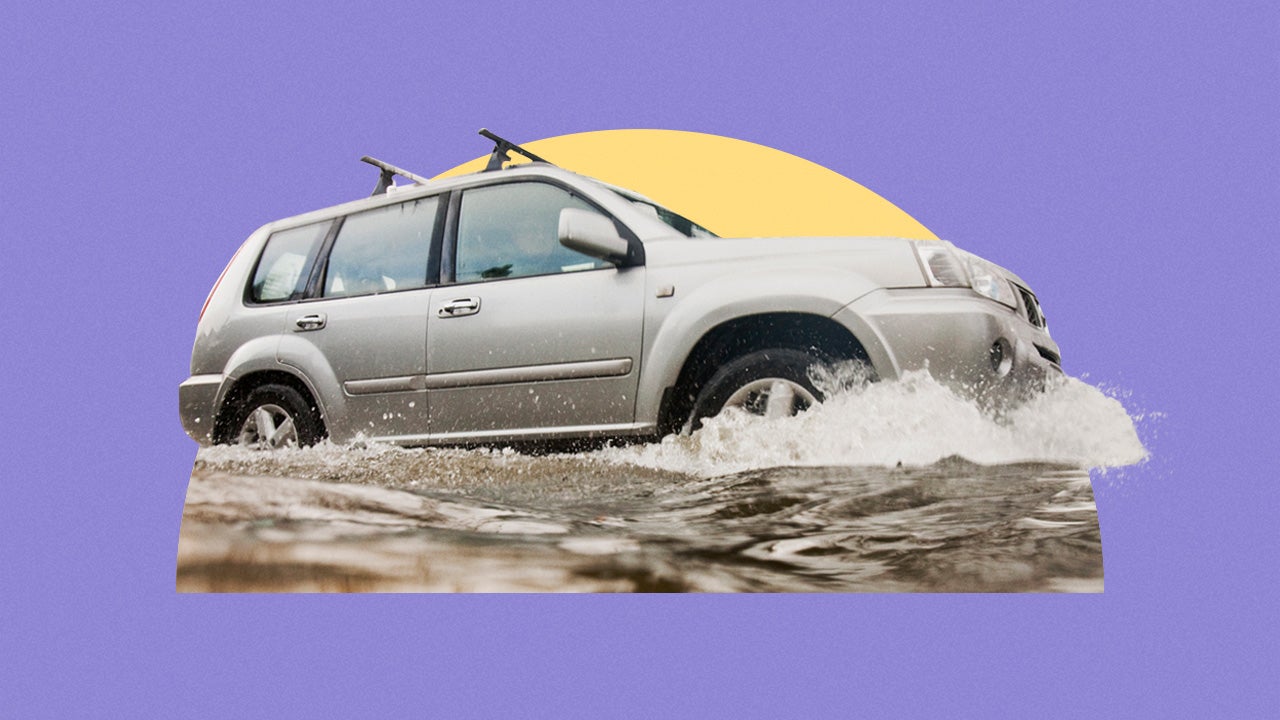 Car driving through flooded area