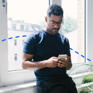 man looking at phone